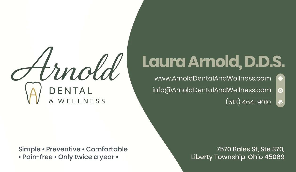 Business card for Arnold Dental & Wellness featuring Dr. Laura Arnold, including contact information, website, email, phone number, and address in Ohio. The card has a white and dark green background with a tooth logo.