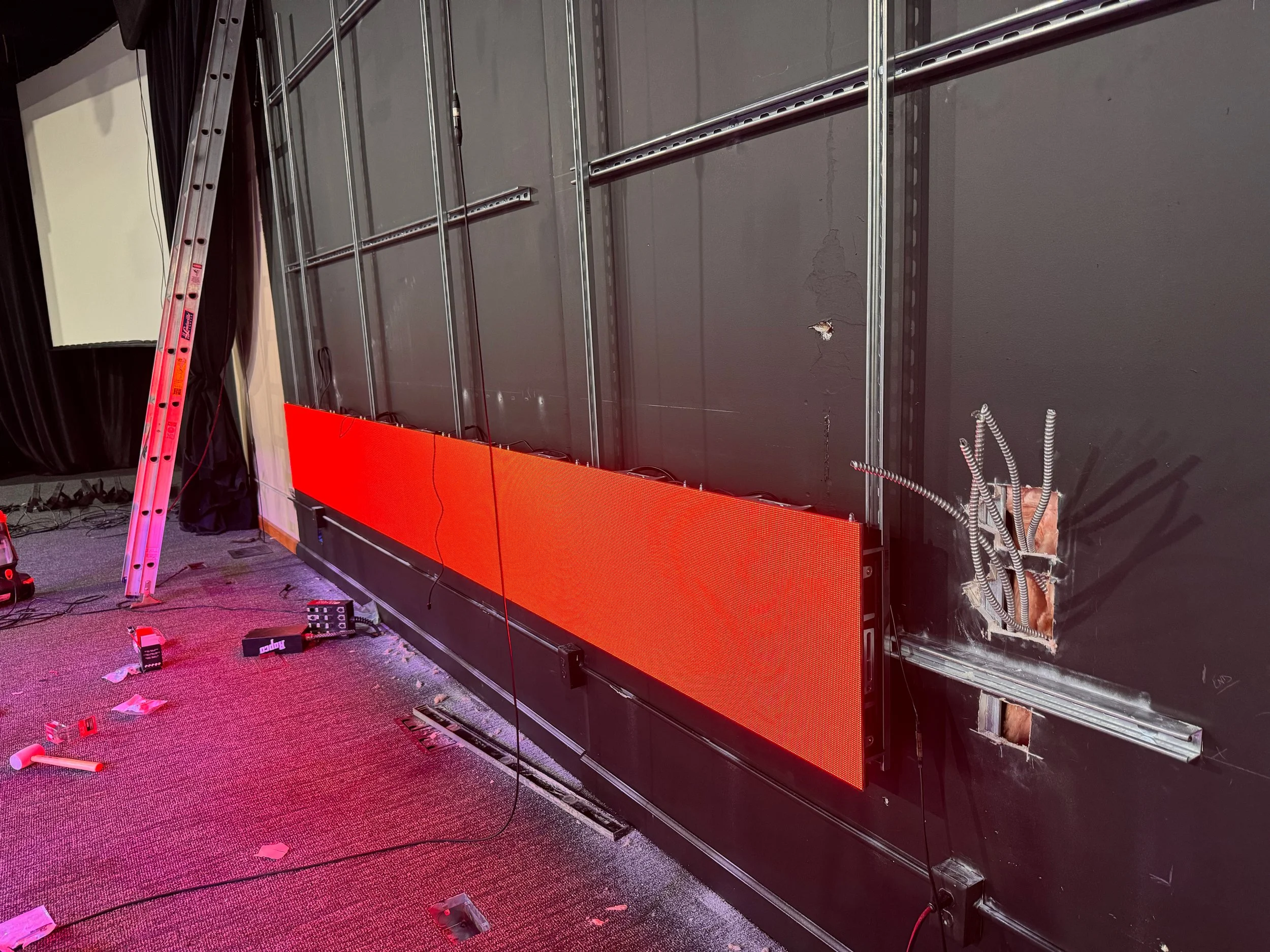 LED wall installation in process, partially built or assembled.