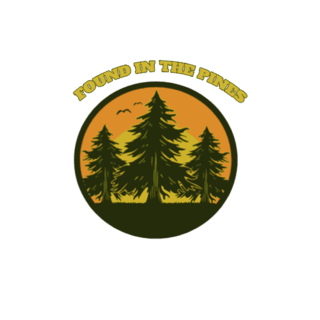 A circular logo with three pine trees silhouetted against an orange sunset or sunrise background, and the words "Found in the Pines" curved along the top edge.