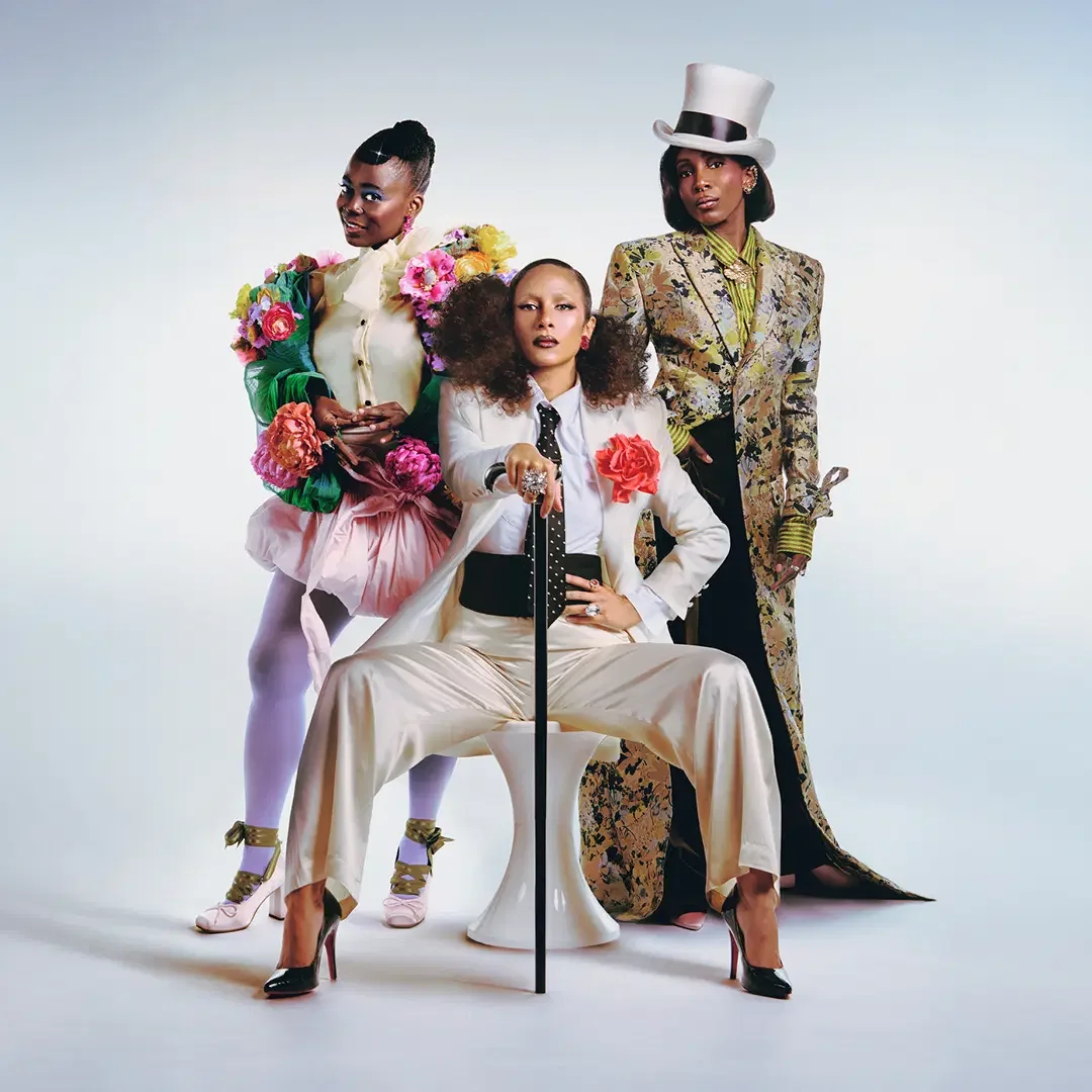 Production photo from Nicholai La Barrie's An Ideal Husband at the Lyric Hammersmith, showcasing Rajha Shakiry's vibrant costume design on the ensemble cast.