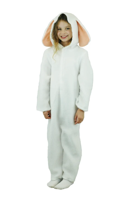 Young girl dressed in a white bunny costume with floppy ears, smiling at the camera.