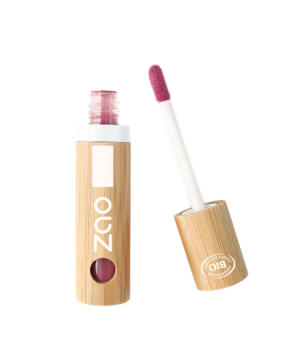 Lip gloss applicator with pink gloss in a bamboo tube