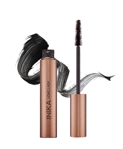 Bottle of Nika Long Lash mascara with wand removed, with black mascara stroke in the background.