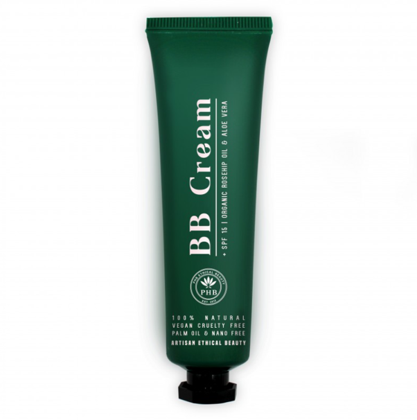 Green tube labeled 'BB Cream' with SPF 15, aloe vera, and rosehip oil, emphasizing natural, vegan, cruelty-free, and artisan qualities.