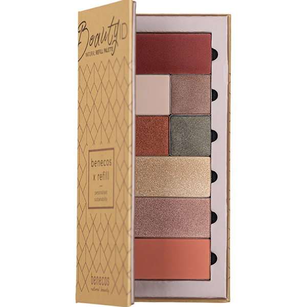 Open box of BeneCos X Refill eyeshadow palette with various shades of eyeshadow in rectangular pans, including red, pink, bronze, gray, gold, and peach, arranged vertically.