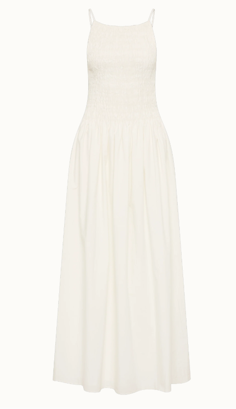 Flowing white maxi dress for exploring on holiday sustainably made by Faithfull