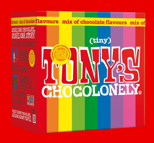 Colorful box of Tony's Chocolonely tiny chocolate bars with rainbow stripes and red background.