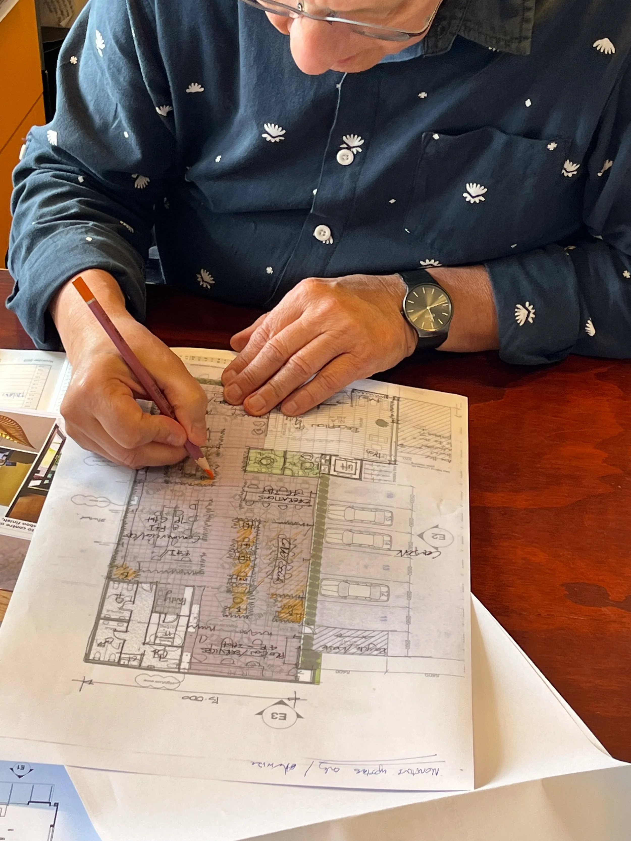 PAUA Architects working on illustrating building design plans