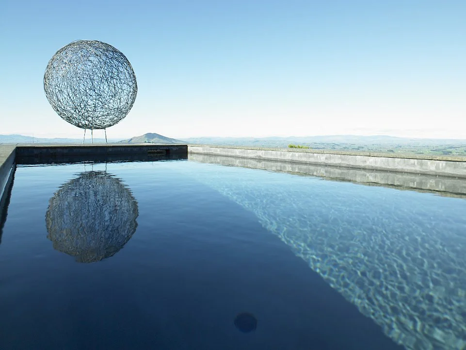 Art sculpture overlooking the mountains