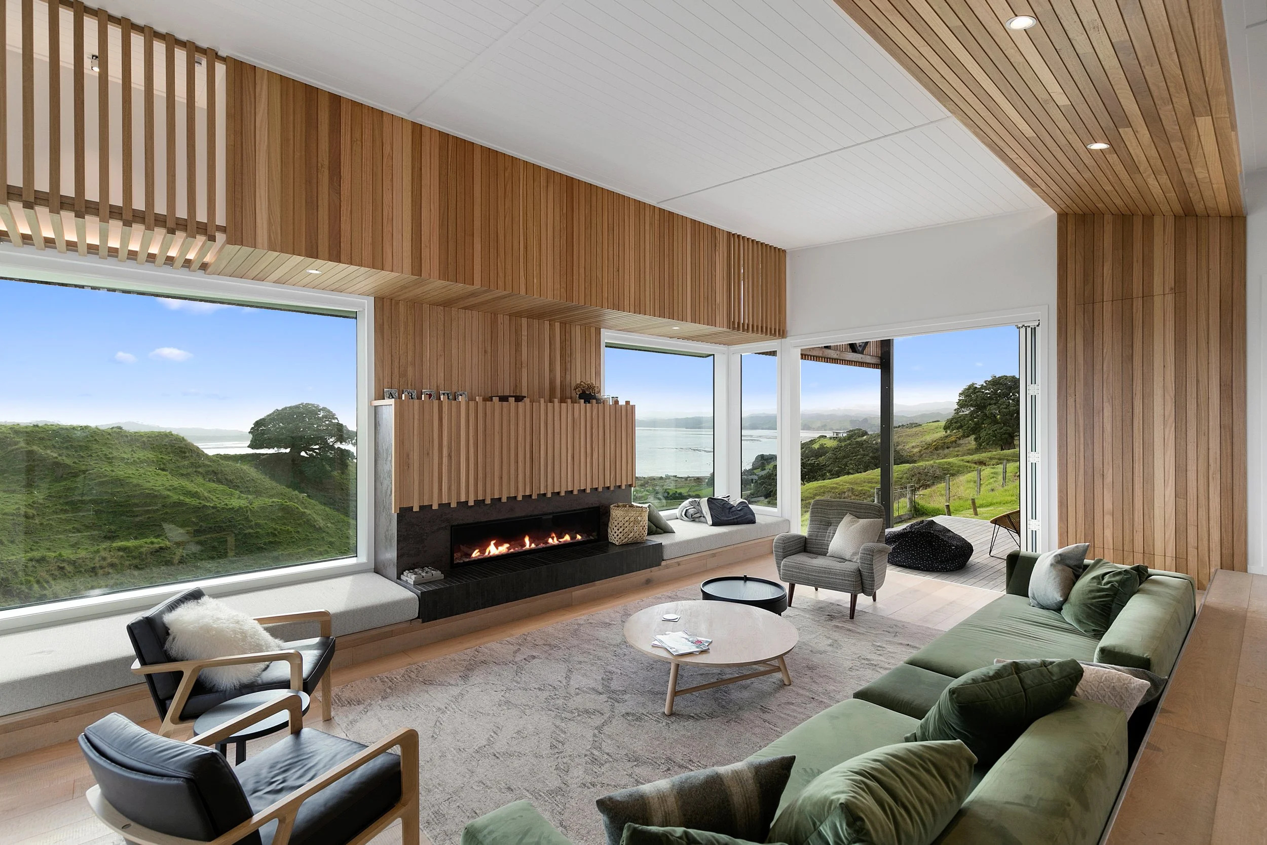 Aotea Bach living area overlooking the hills and ocean