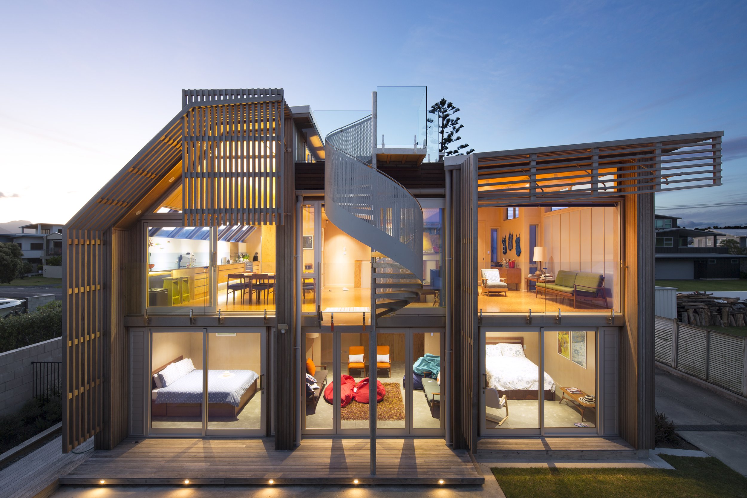 Pipi Road Beach house with spiral staircase and open windows