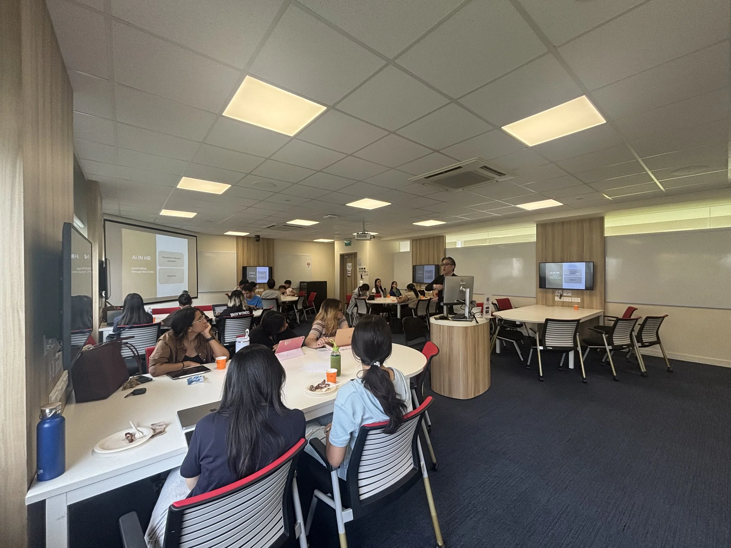 Learners engaged in a workshop on personal branding