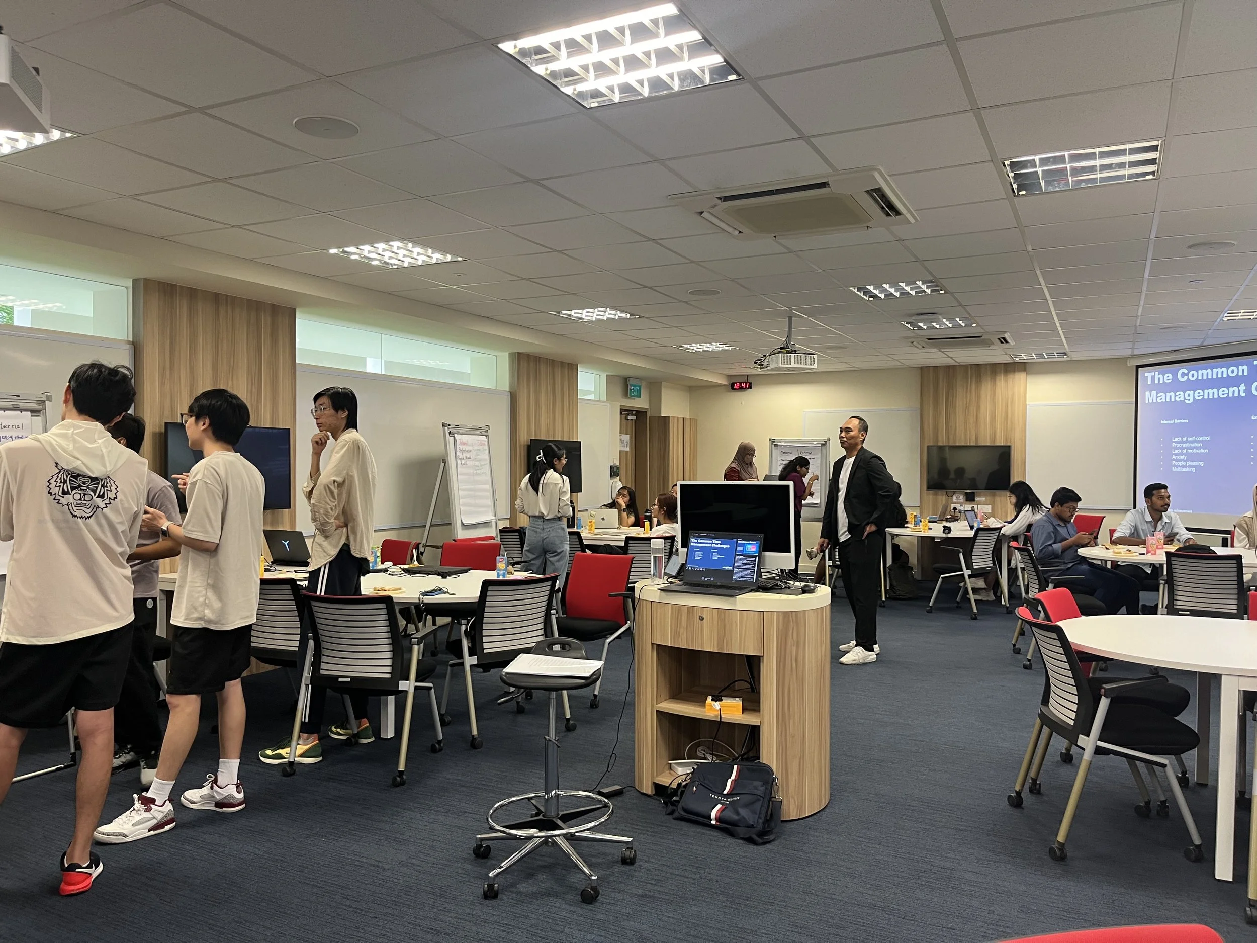 Tertiary students participating in discussions and flipboard activity during a soft skills workshop