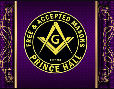 Masonic emblem with the text 'Free & Accepted Masons Prince Hall' and 'Est. 1784' on a purple background with decorative gold borders.