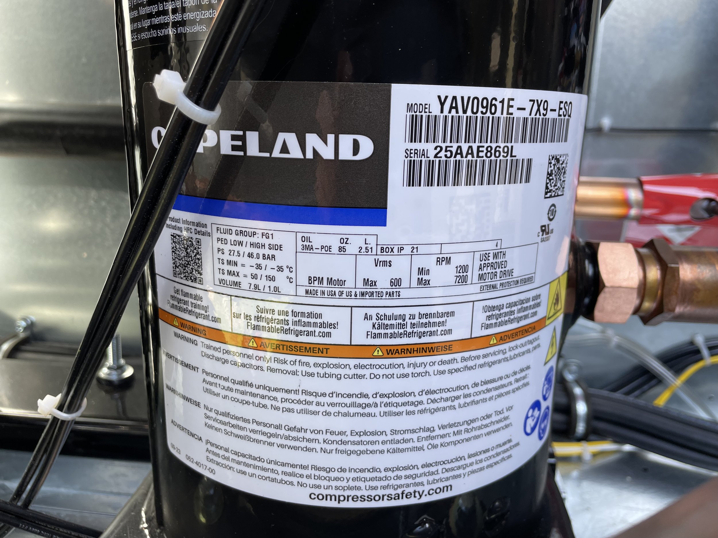 Close-up of a Copeland HVAC Compressor that was diagnosed as short to ground.