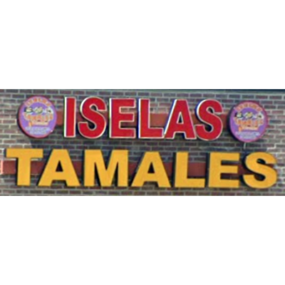 Sign for Iselas Tamales with red and yellow letters on a brick wall background