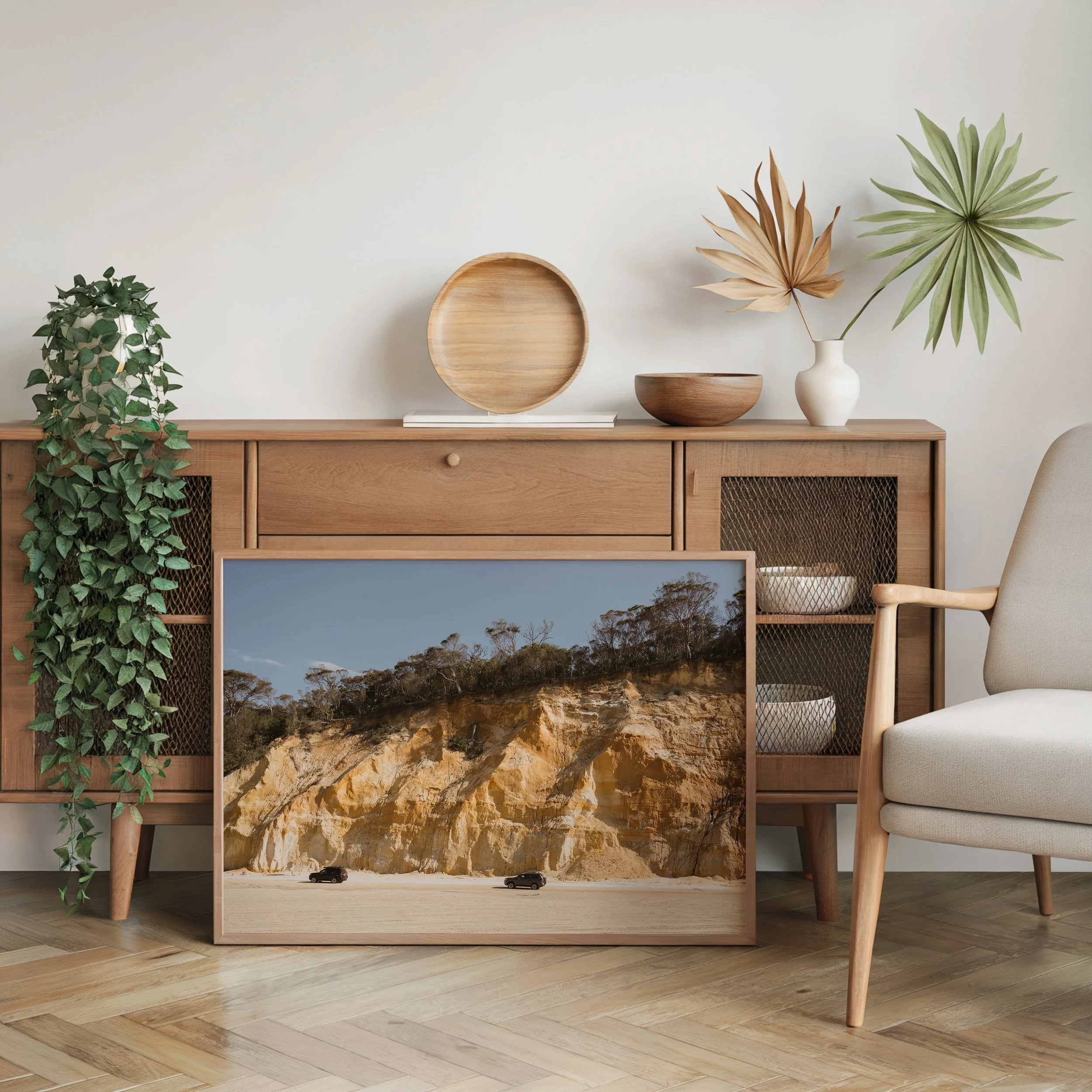 4WD coastal landscape print styled as wall art in a modern interior