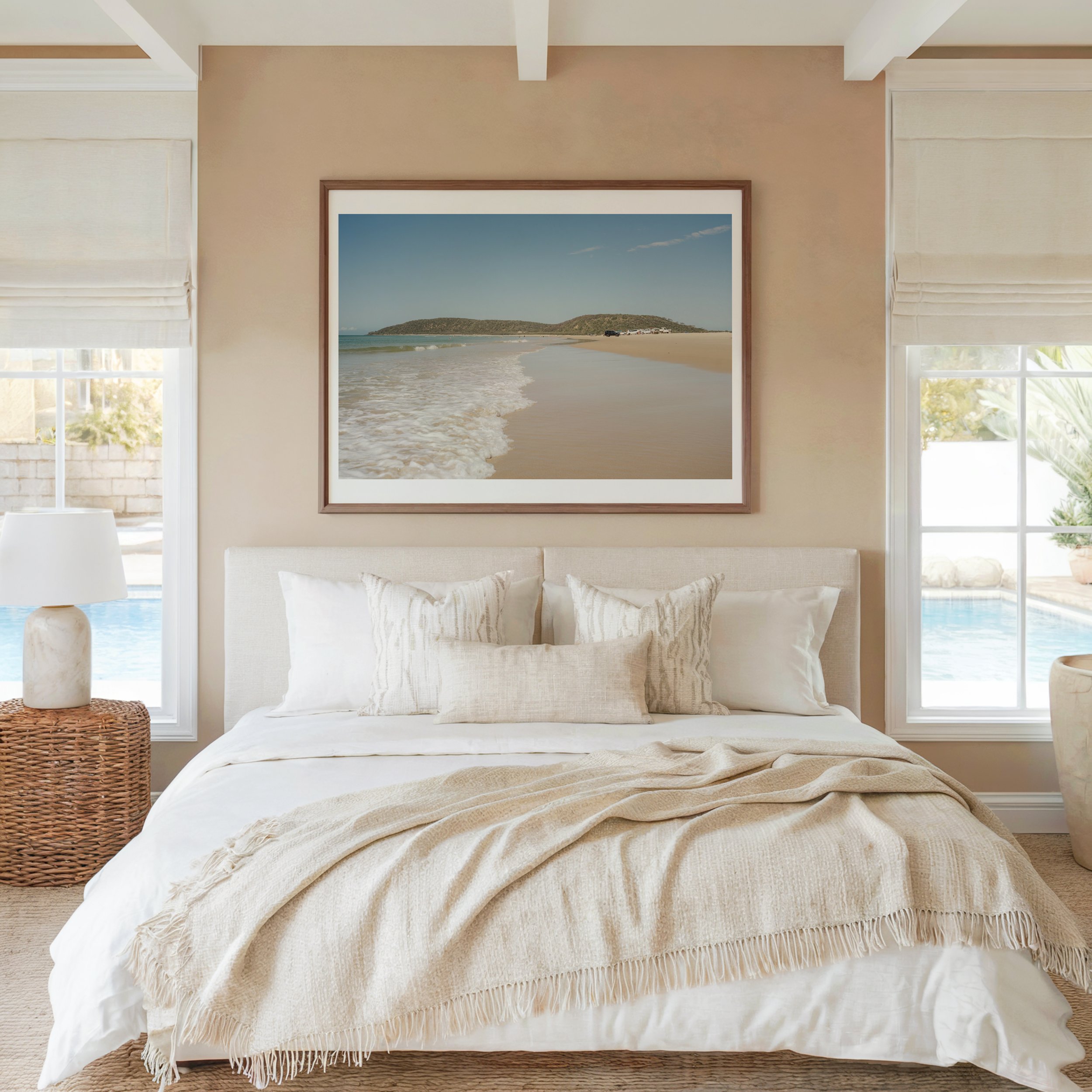 Lifestyle mockup of Lagoon Days Rainbow Beach coastal photograph styled in a coastal bedroom