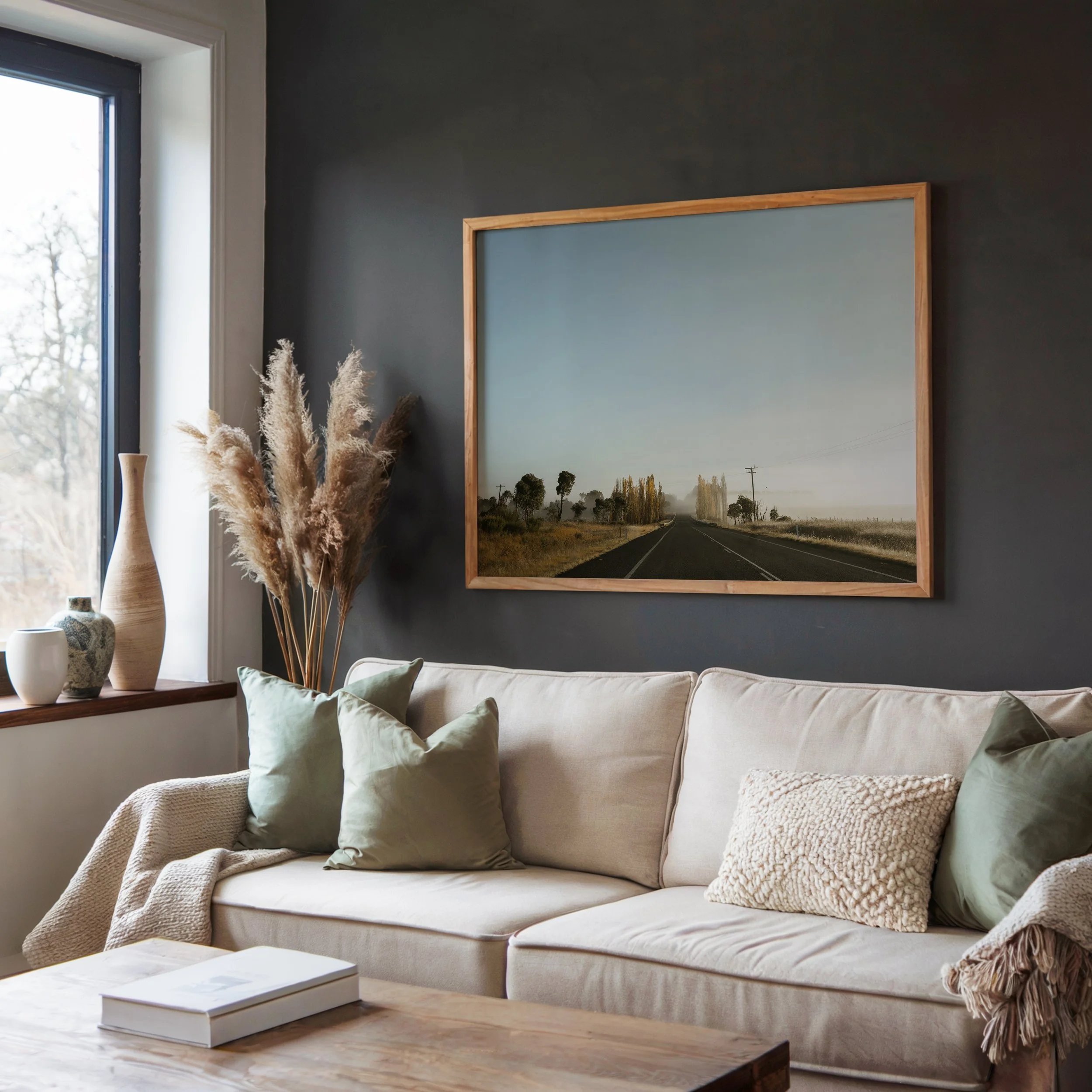 Framed rural NSW landscape photograph displayed in a living room setting