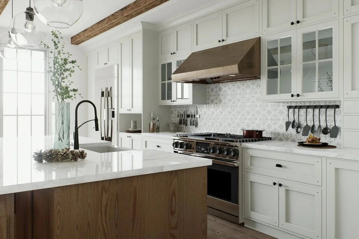 Modern bright kitchen with white cabinets, a wooden island, a stainless steel stove, a range hood, and decorative elements like plant, utensils, and plates.