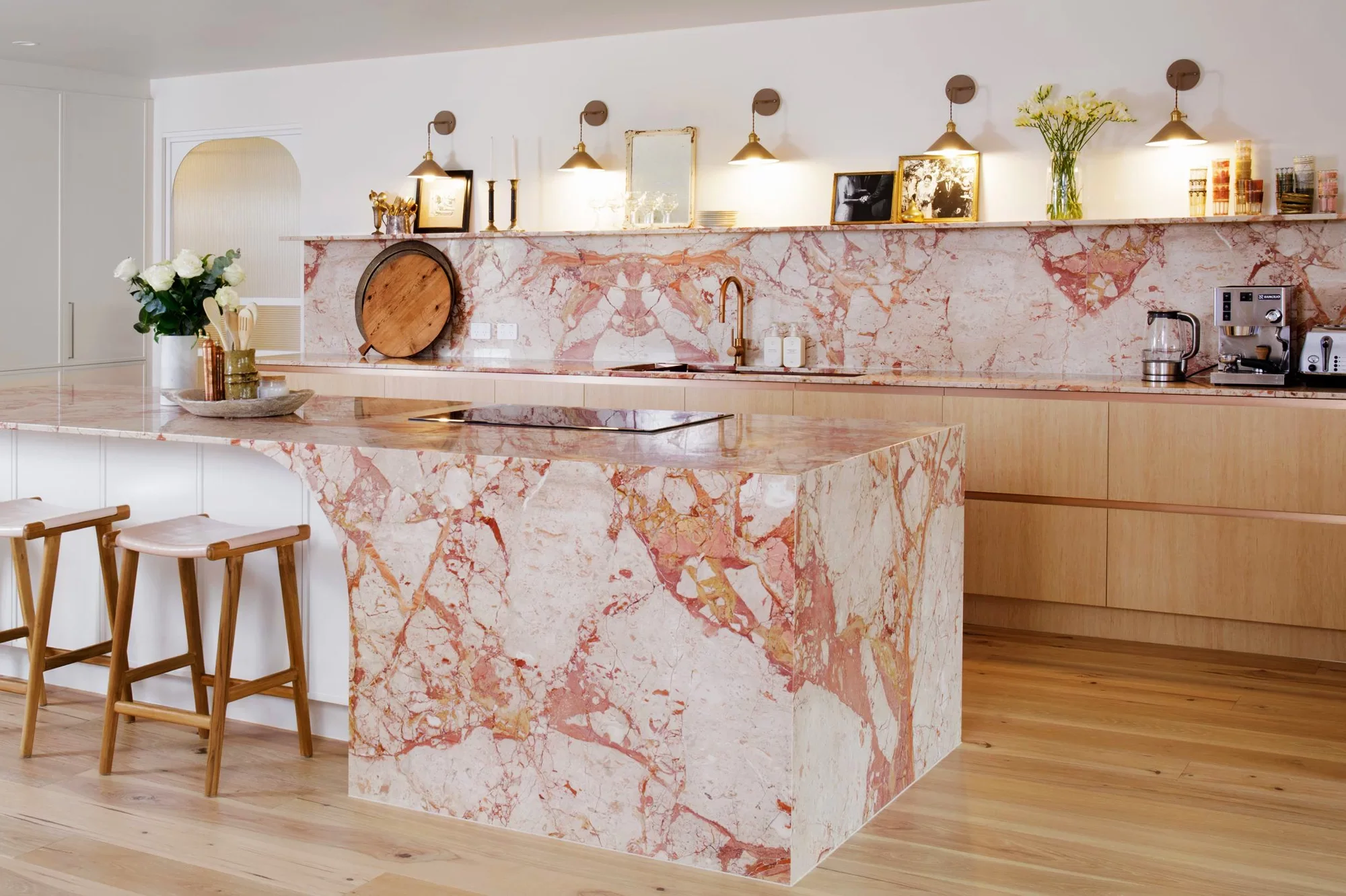 Natural stone marble benchtop kitchen Western Sydney — granite or marble slab with unique veining, Sunday Kitchens & Living showroom