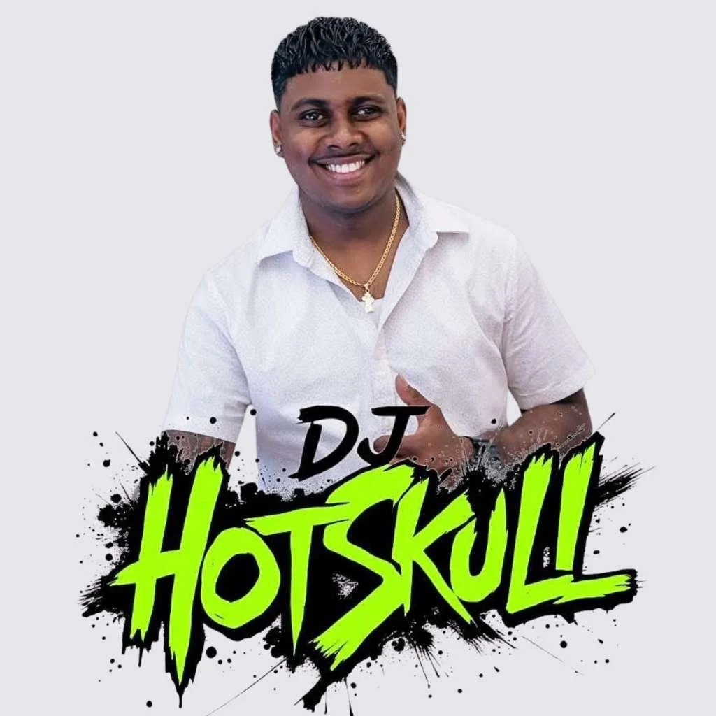 A smiling man with short black hair wearing a white shirt, gold chain, and earrings, standing against a plain background with the text 'DJ HOTSKULL' in bold green and black graffiti-style font.