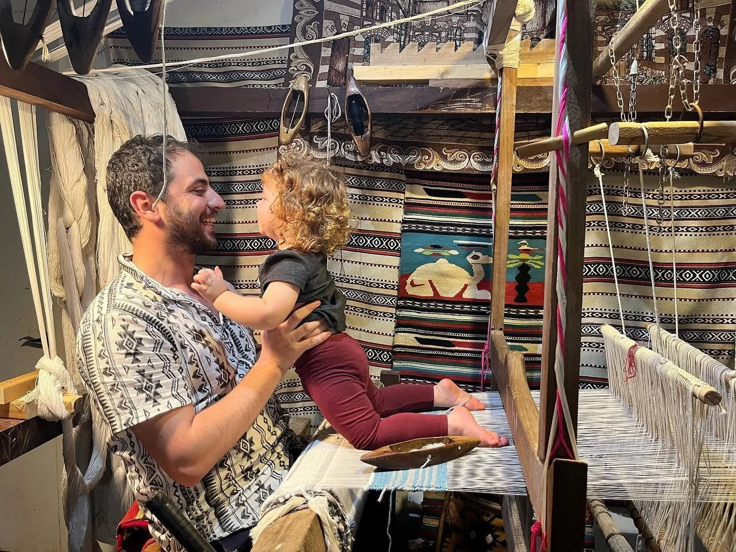 Mila on loom.jpg