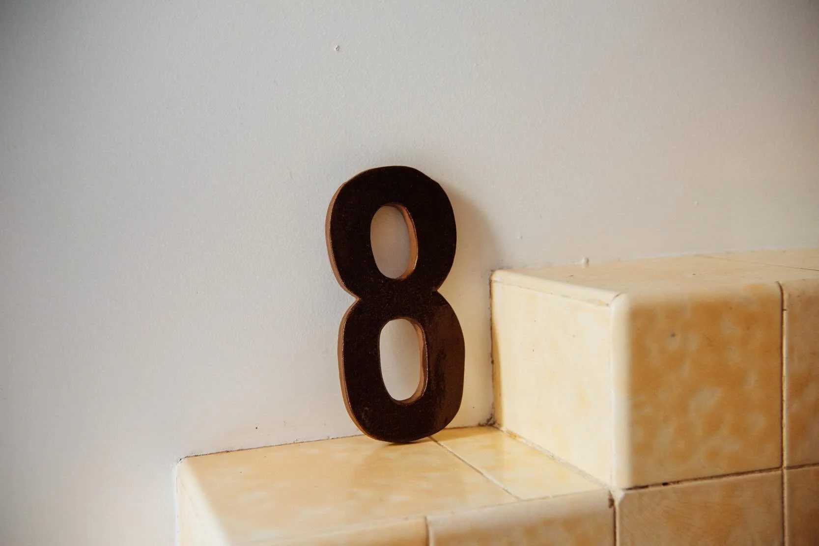 We are now taking orders for our house numbers! They have had a bit of a shake up - with a new clay and glaze combo, keeping it simple with a white or dark clay body and clear glaze to finish. Hand rolled, then cut and compressed to dry to avoid warp