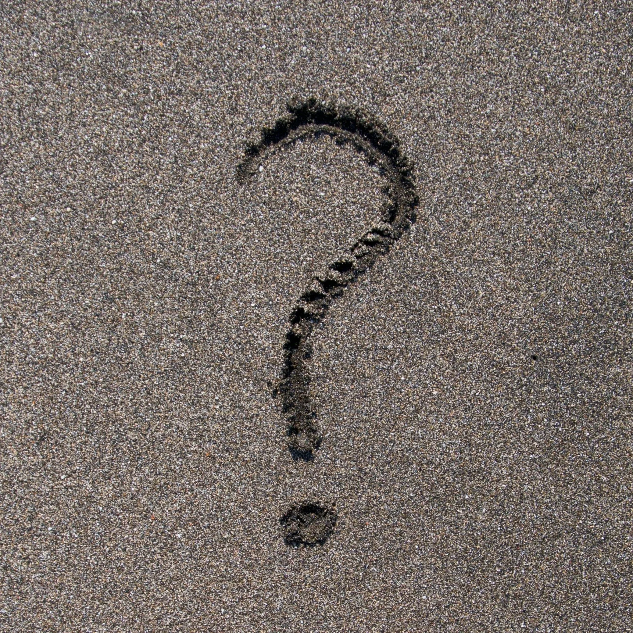 Question mark in the sand