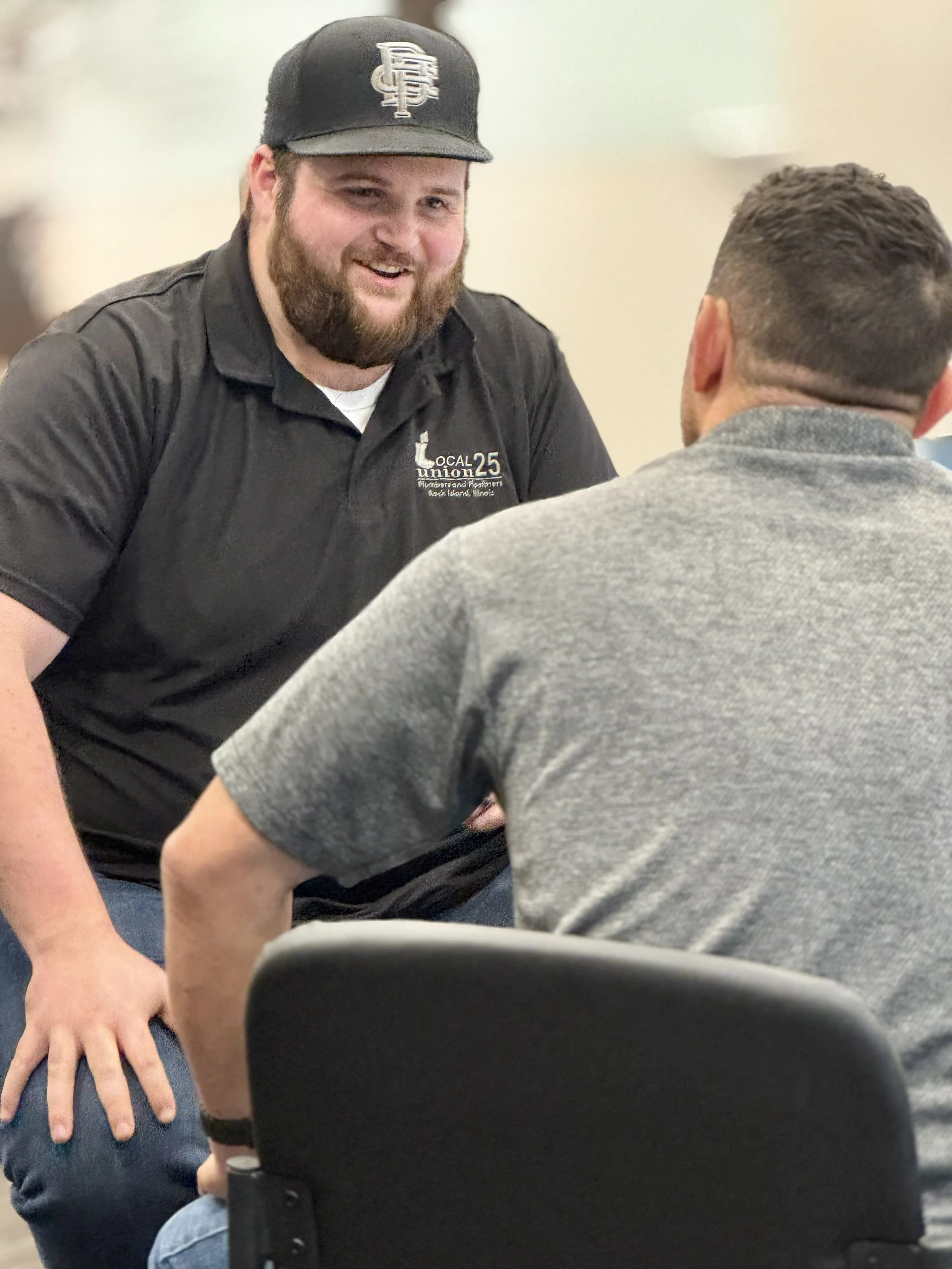 Two coworkers having a conversation