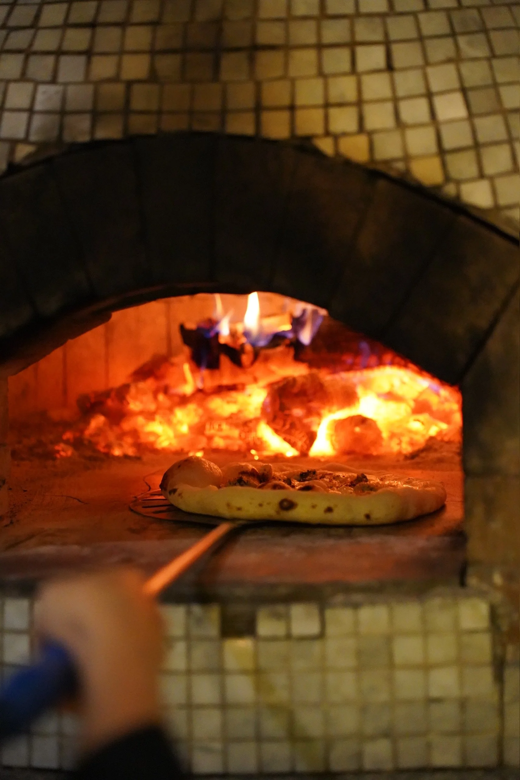Wood-fired pizza at The Palm — Modern Mediterranean 
restaurant in Hai Phong