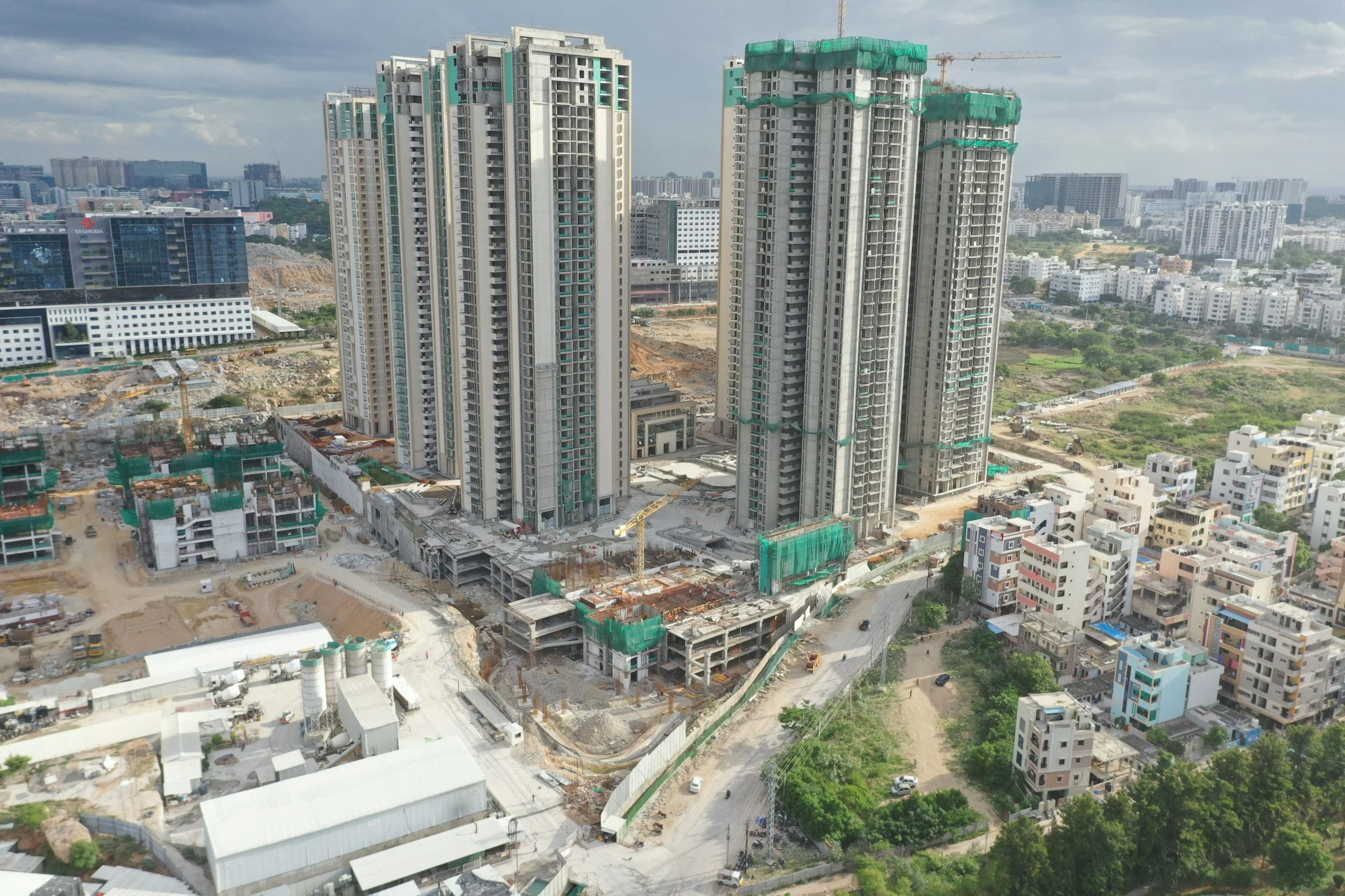       
  
    Cash Compensation for delay in flat handover not taxable under Section 50C  Suvarna Chandrakant Bhojane (‘the Assessee’), had entered into a development agreement for construction of flats on her land. As per the terms of the agreement,