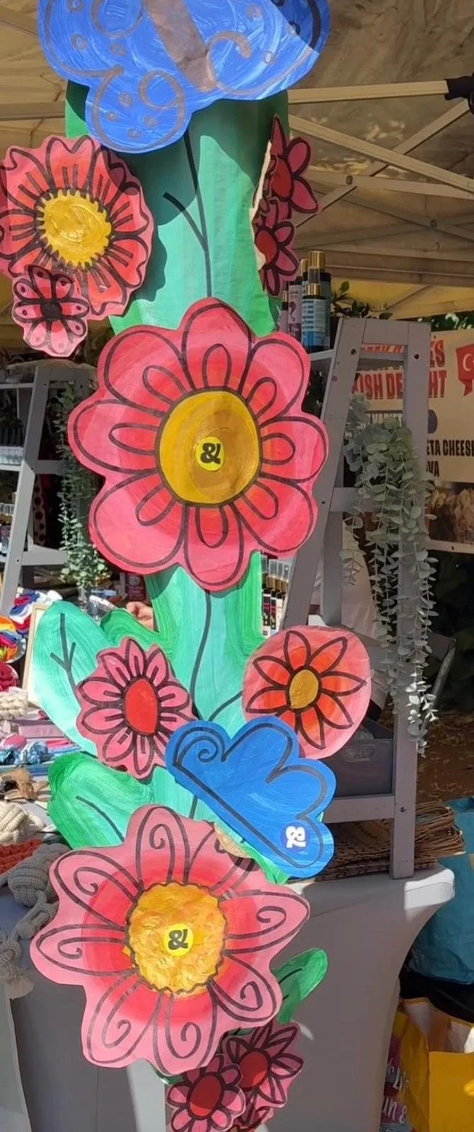 Painted paper flowers and insets in pinks and greens