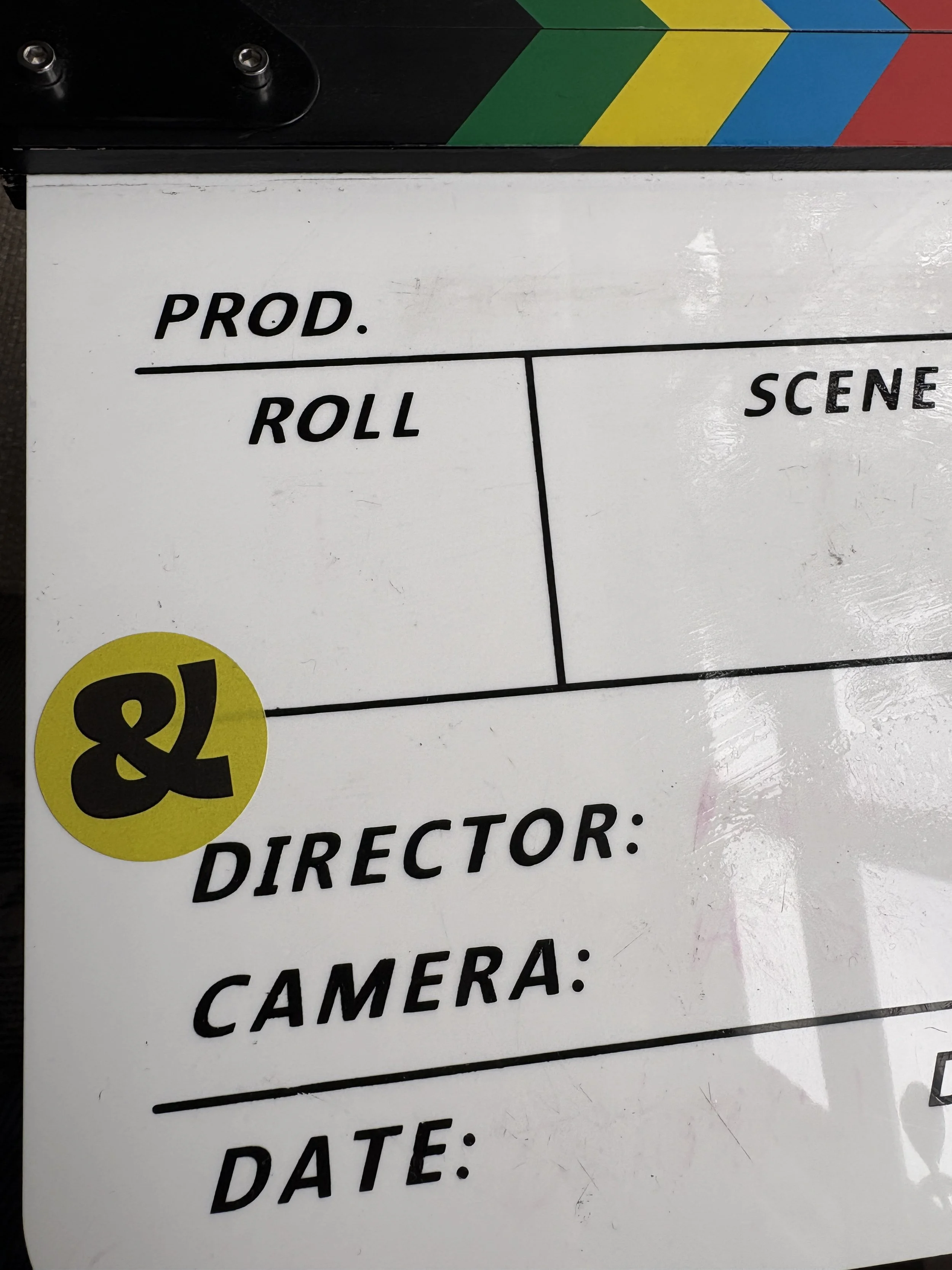 film reel board with a green and black sticker