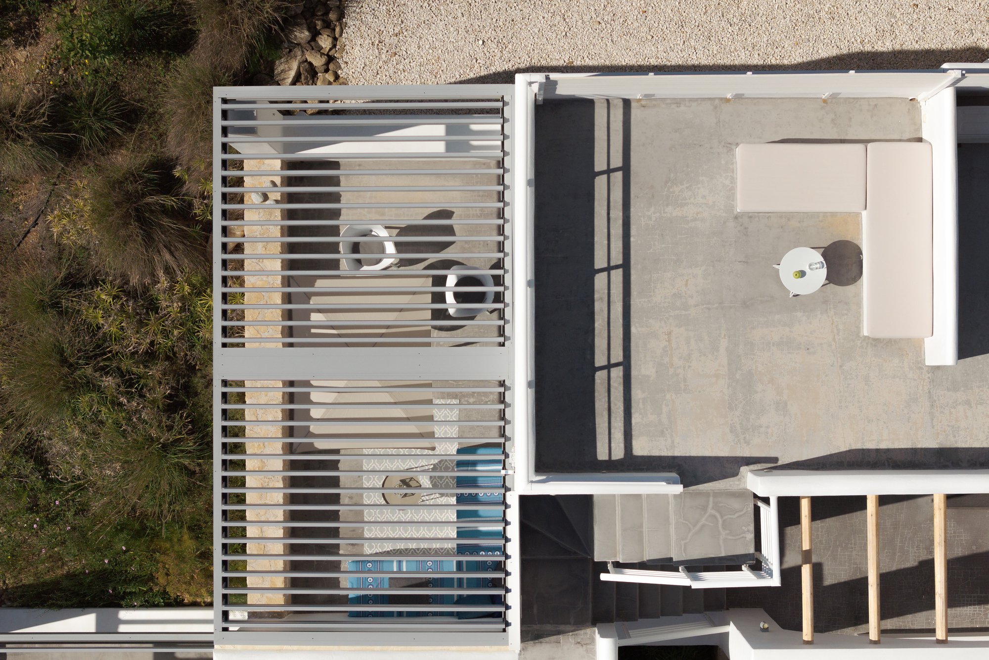 Top-down architectural view of minimalist private terraces at Galini Breeze Crete.