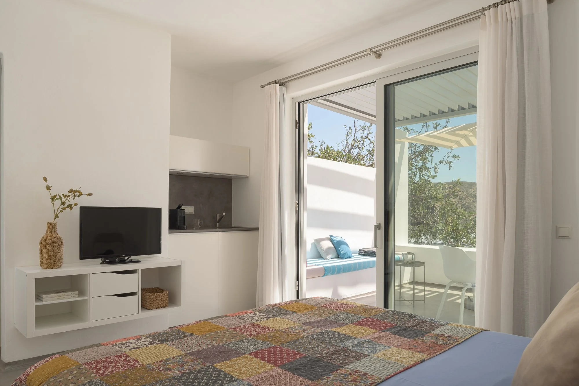 Modern coastal living space in Agia Galini with curated interior design details.