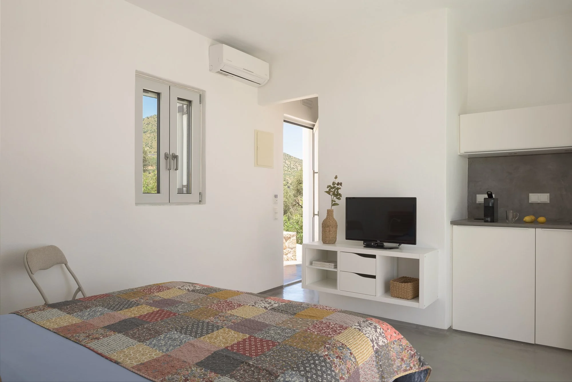 Boutique hospitality details and minimalist aesthetics at Galini Breeze.