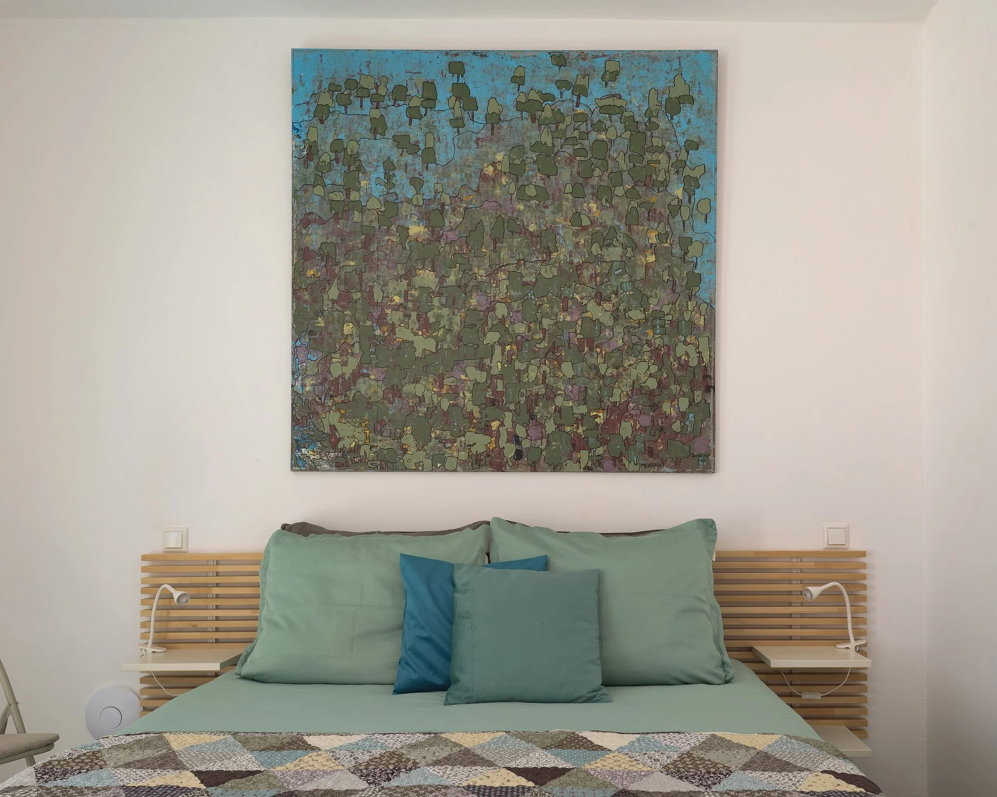 Open-plan coastal suite in Agia Galini with contemporary white interiors.