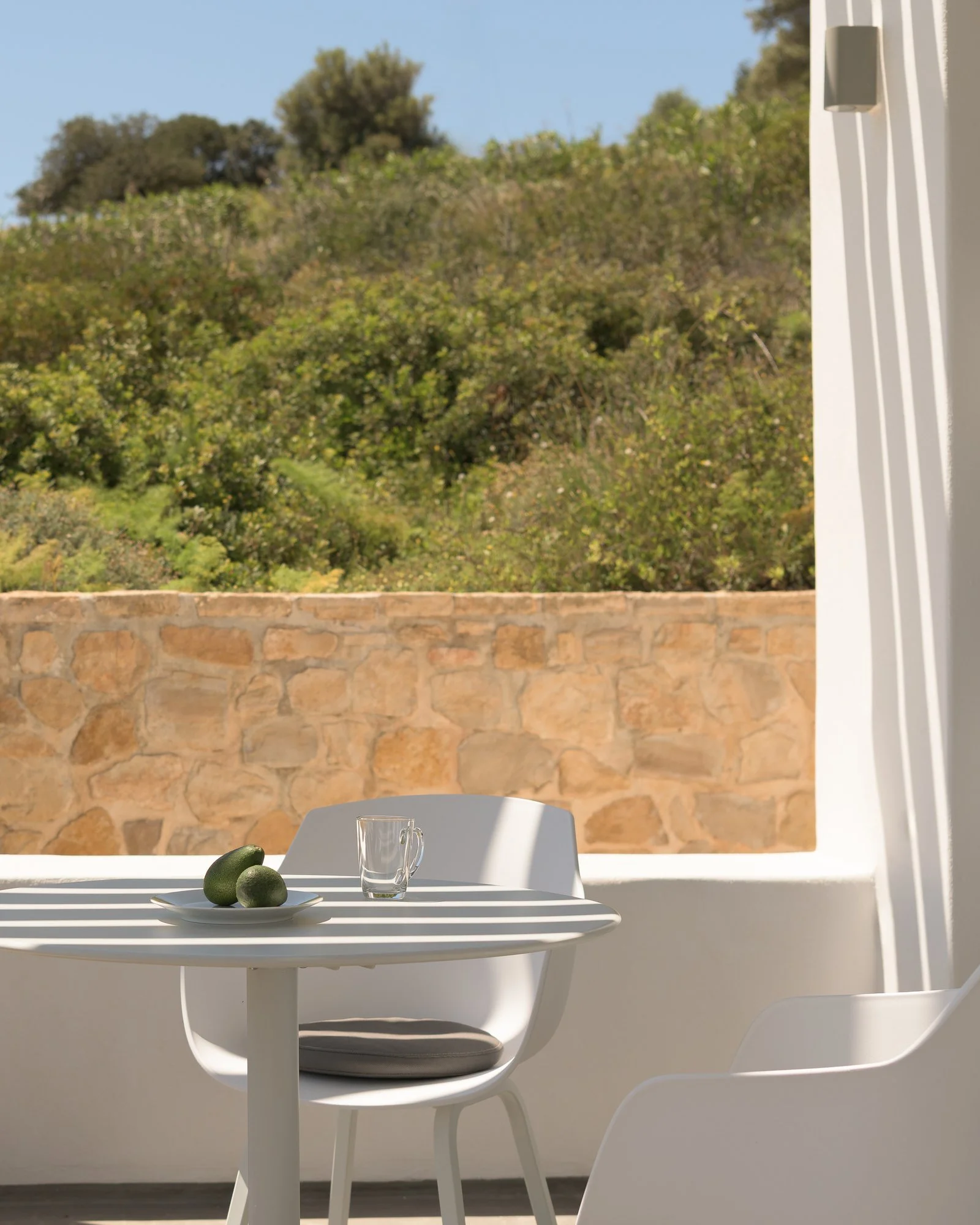 Private outdoor breakfast terrace at Galini Breeze overlooking the hills of South Crete.