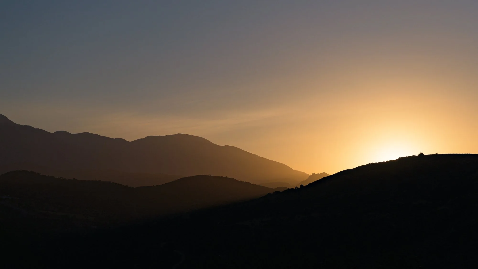 Sunset over the mountains of South Crete near Galini Breeze boutique accommodation.