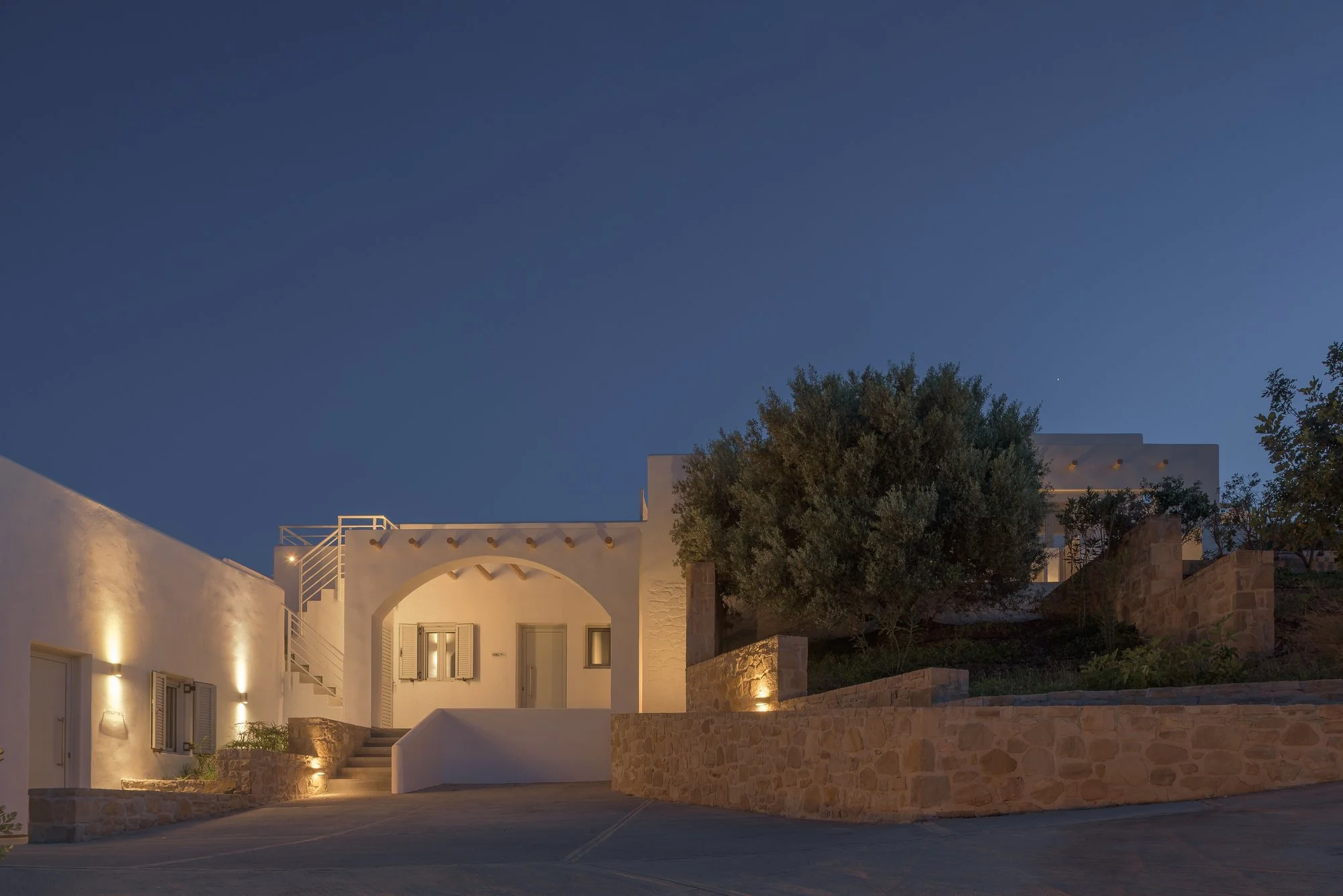 Nighttime exterior of luxury adults-only accommodation near Agia Galini, Crete.
