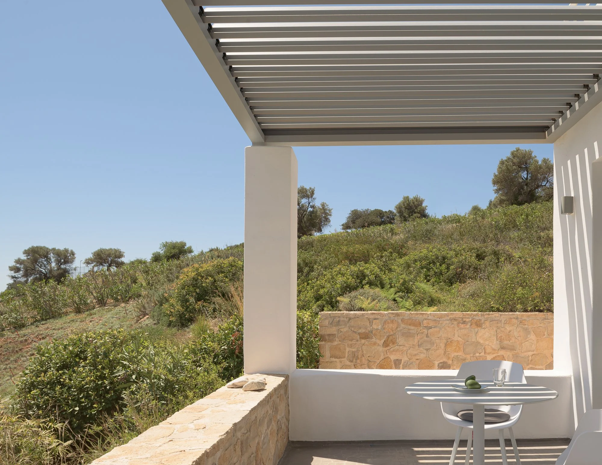 Private shaded balcony overlooking the hills and coastline of South Crete.