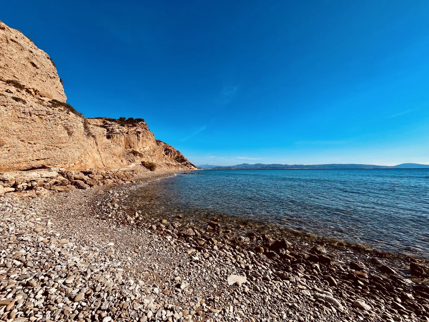 Agia Galini village beach — Blue Flag pebble beach in the harbour of Agia Galini, South Crete