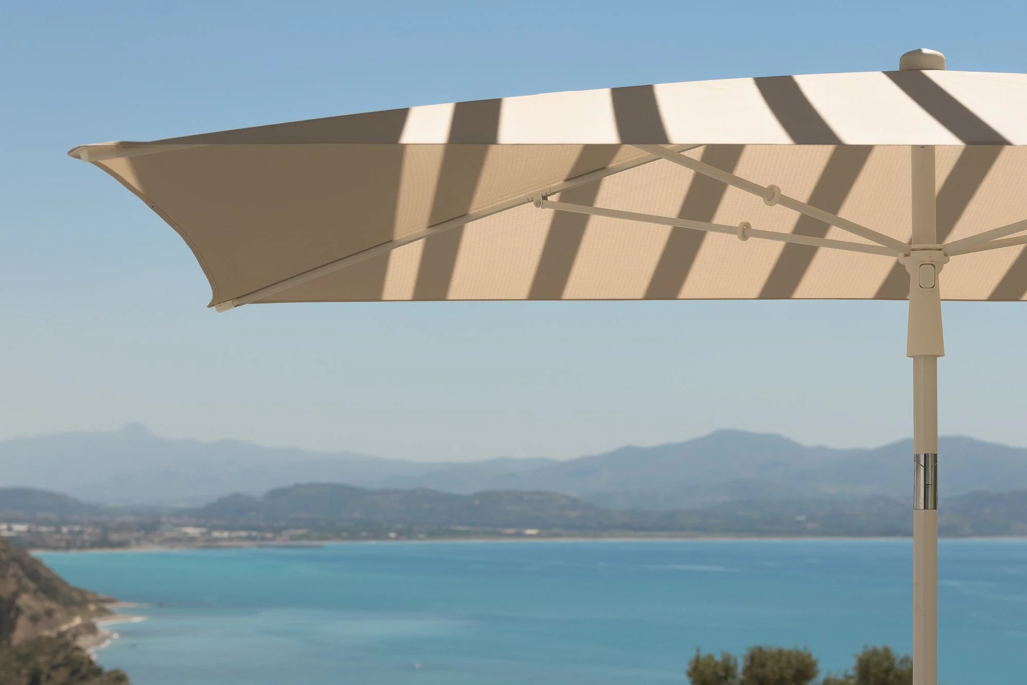 Panoramic Libyan Sea view framed by minimalist pergola architecture.