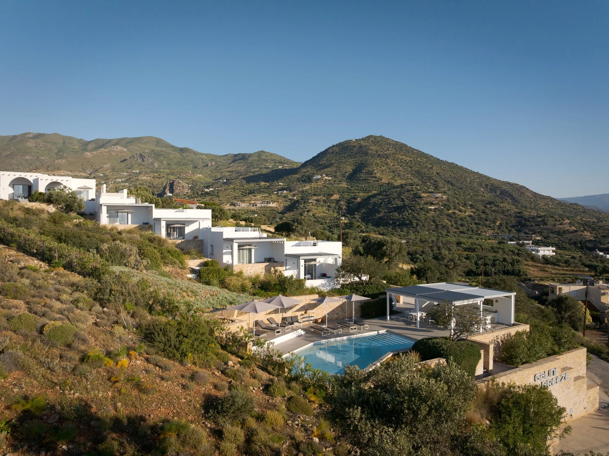 Hillside adults-only resort with panoramic mountain views in South Crete.