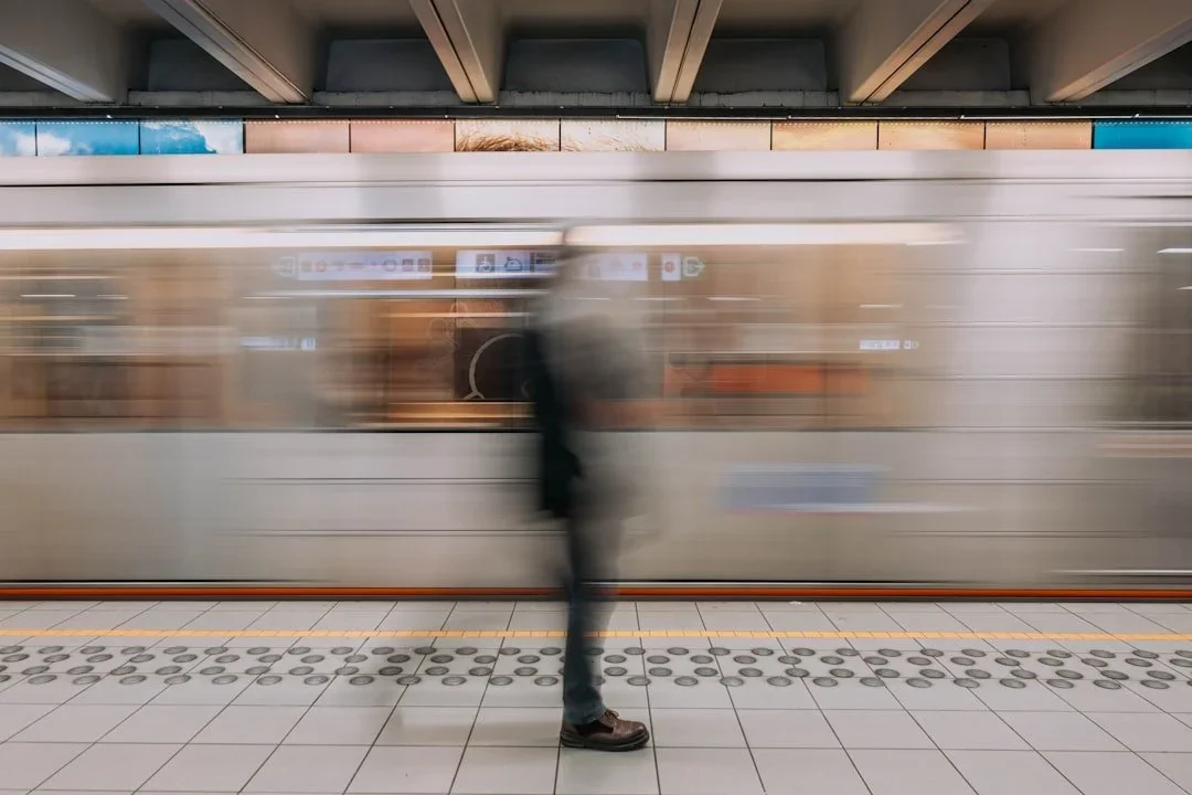 Person on a subway platform in motion