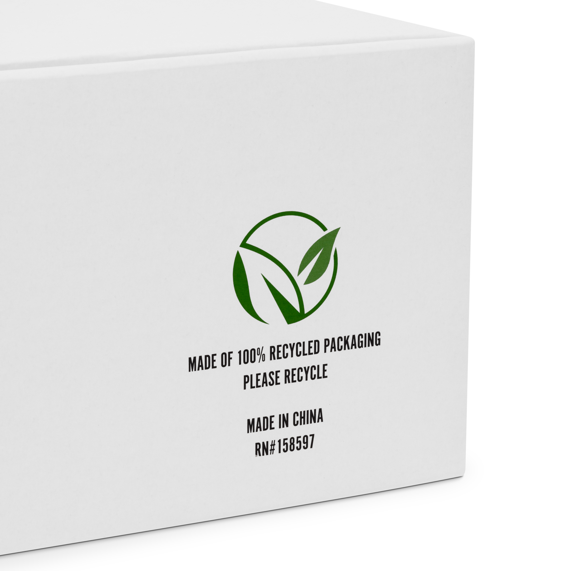 Close-up of a white packaging box with green recycling symbol and text indicating it is made of 100% recycled packaging, made in China.