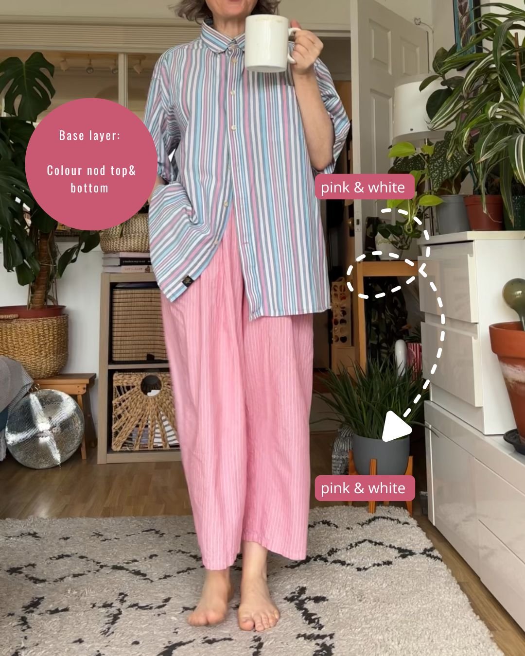 Colour nods, base layer: pink, blue and white striped oversized shirt over pink and white striped wide-leg trousers, the pink and white repeated top and bottom