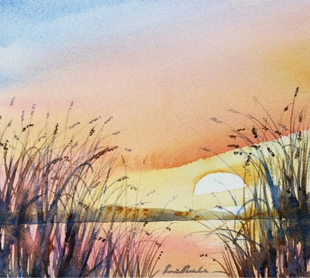 Watercolor painting of a sunset over a lake with tall grasses on both sides. Painted by Lorraine Rimmelin.