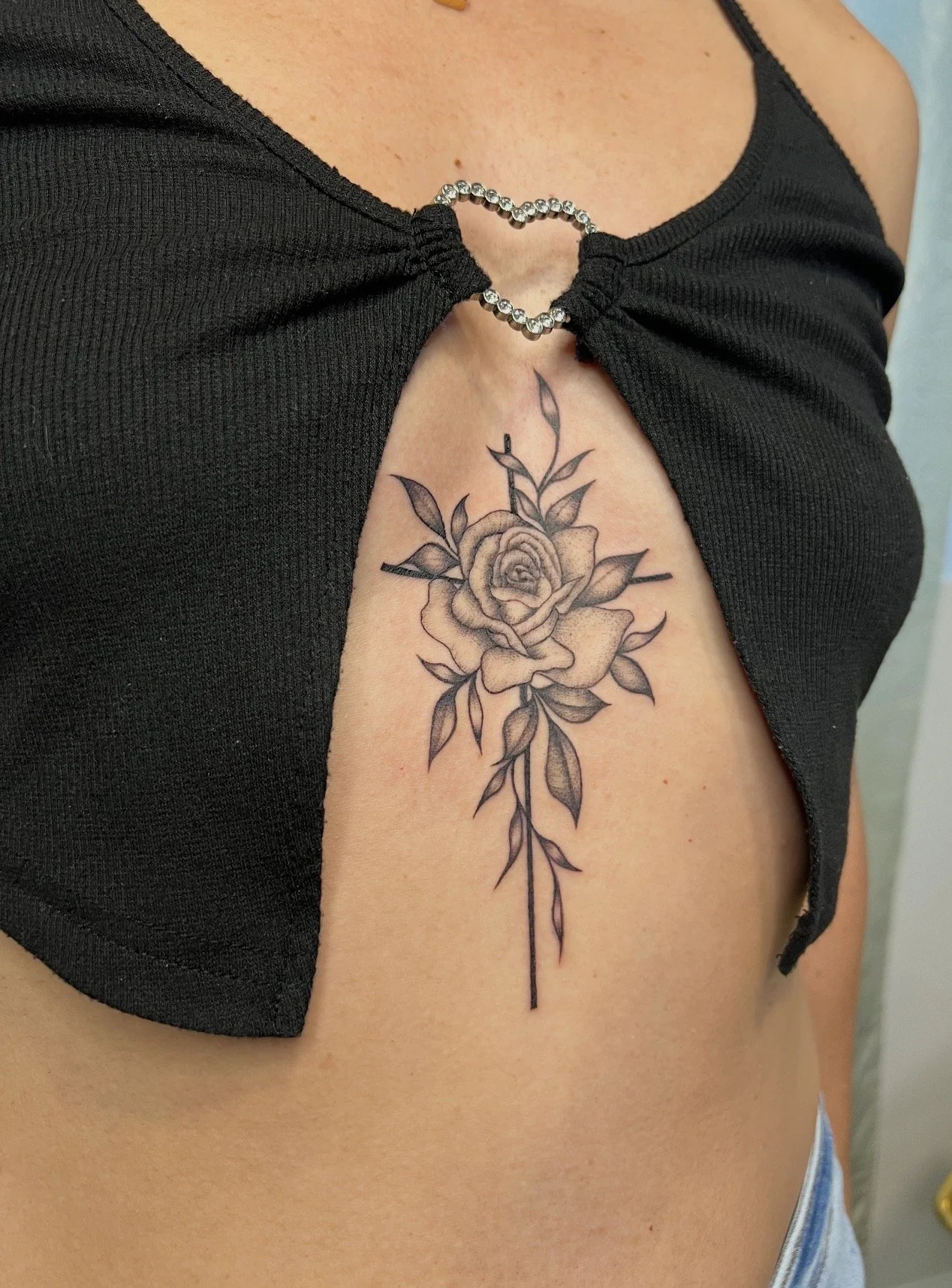 Black and grey rose tattoo by Telley
